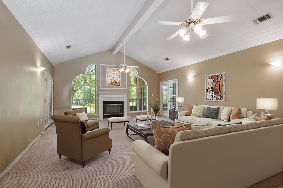 grand living with fireplace! plenty of space to relax!