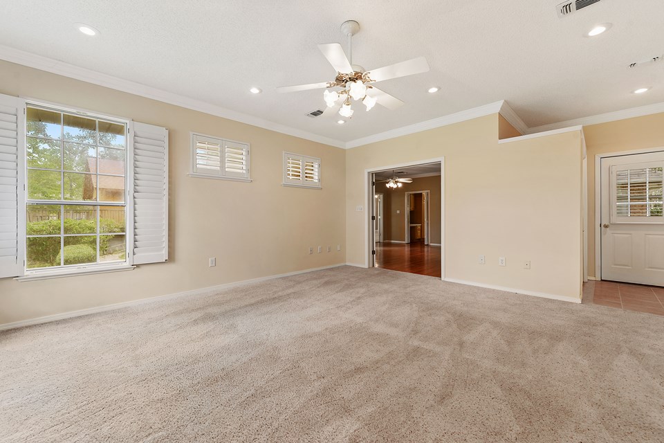 game room or office with side entrance of home.