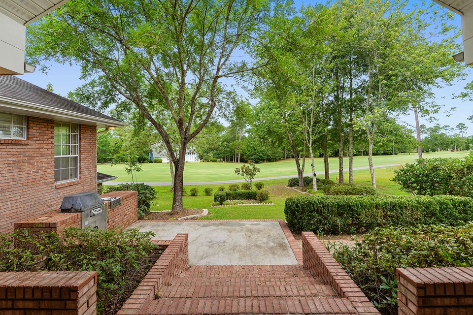 golf course just steps away! enjoy the view of golf course and outdoor built in bbq pitt.
