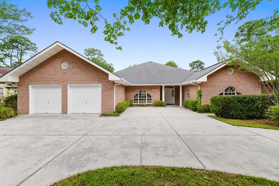 brand new roof december 7th 2020,  new gutters and new garage door panels!   come see this 3 bedroom 3 baths home, plus a beautiful home office with side entrance.  get ready for your tee time, right out your backyard, including private golf cart garage!   this beautiful custom built home by jones builders, over 90 feet on scenic, grounds of the pines, 16th fairway.  soaring cathedral ceilings in grand living room with a cozy fireplace is waiting for you!  start relaxing now, out on the rear patio, bbq and enjoy the unobstructed views of manicured green space.